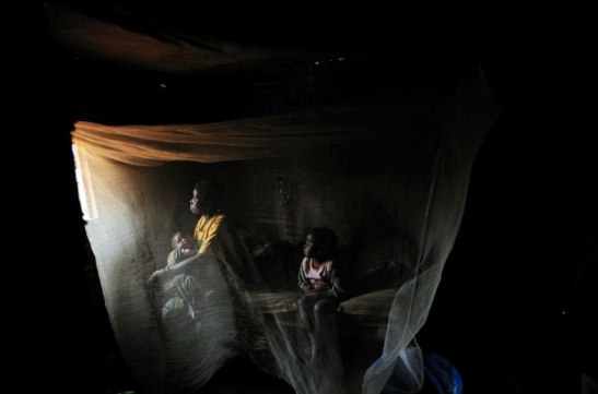 Kahindo, 20, sits in her tent with her two children born out of rape in North Kivu, Eastern Congo, 2008. Lynsey Addario/Getty Images Reportage