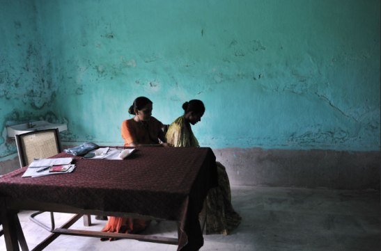A doctor checks a patient for signs of tuberculosis in India, 2010. Lynsey Addario/Getty Images Reportage