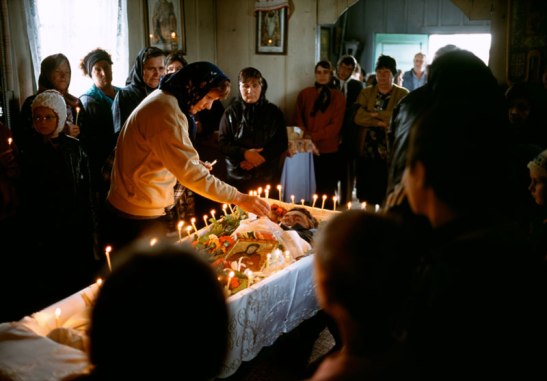 "I broke down in the church, thinking of how beautifully this man's death was being witnessed," Kashi wrote of a Romanian funeral in 2001. Photo (c) Ed Kashi/VII Photo