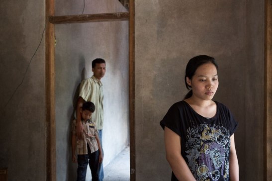A victim of human trafficking, Seni was eventually reunited with her husband and son. Image (c) Mark Tuschman