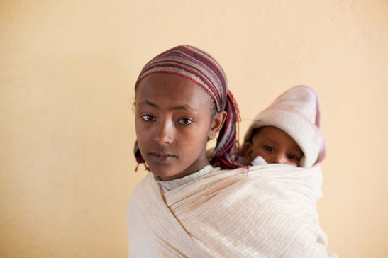 In Shire, Ethiopia, this young woman is with her second child. Image (c) Mark Tuschman